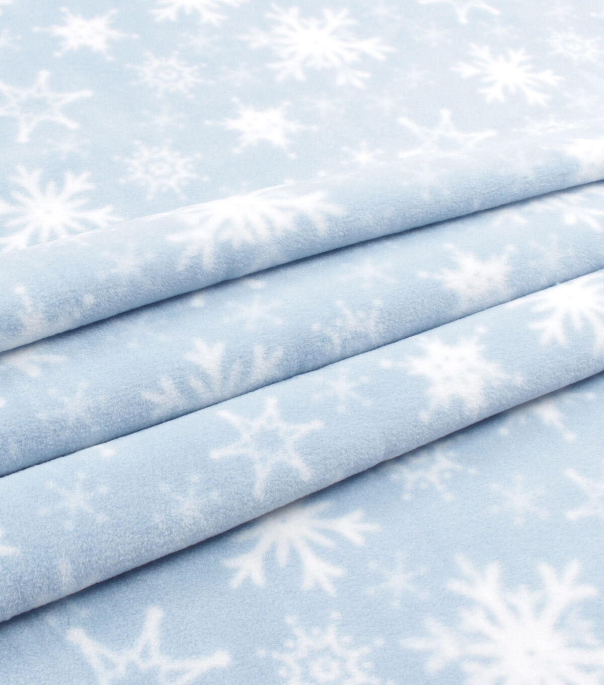 White Snowflakes on Blue Anti Pill Fleece Fabric